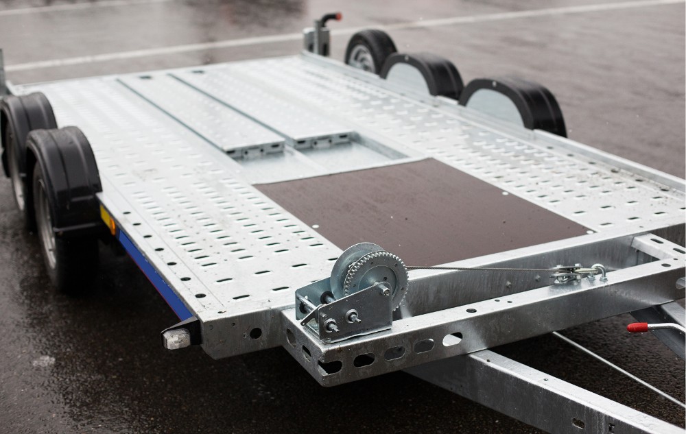 Trailer flooring and cargo control